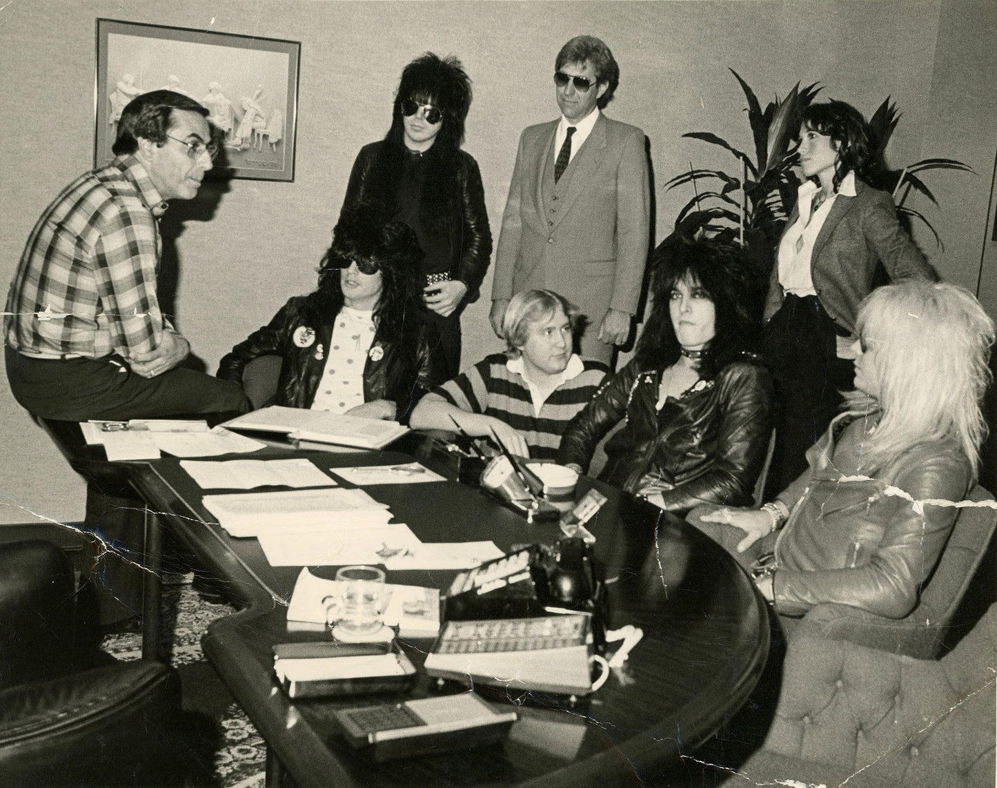 Motley Crue and Elektra Chairman Joe Smith at their major label signing in LA 1982