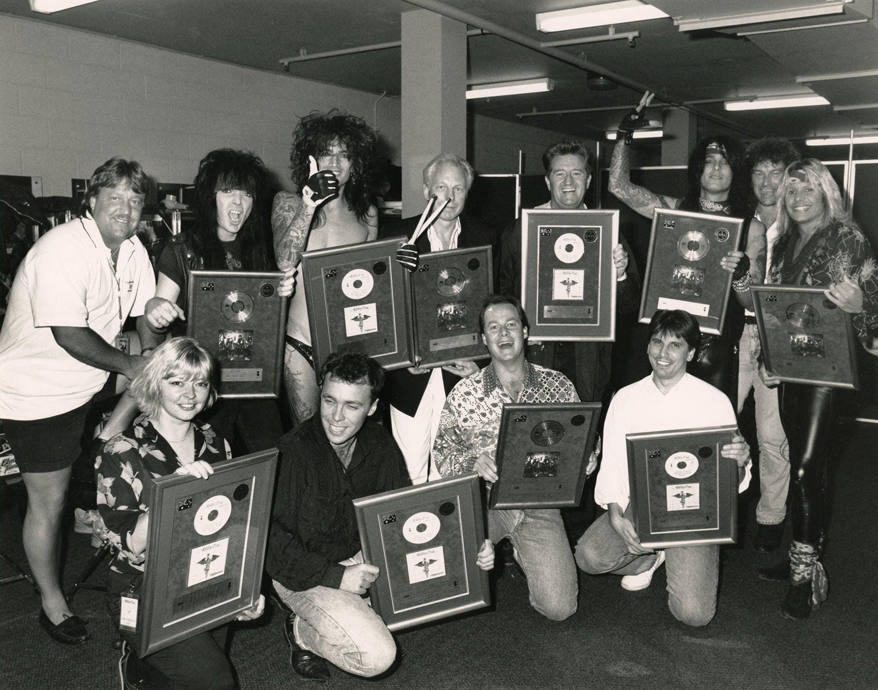 Motley Crue celebrates Australian RIAA success with Girls Girls Girls and Dr. Feelgood circa 1990